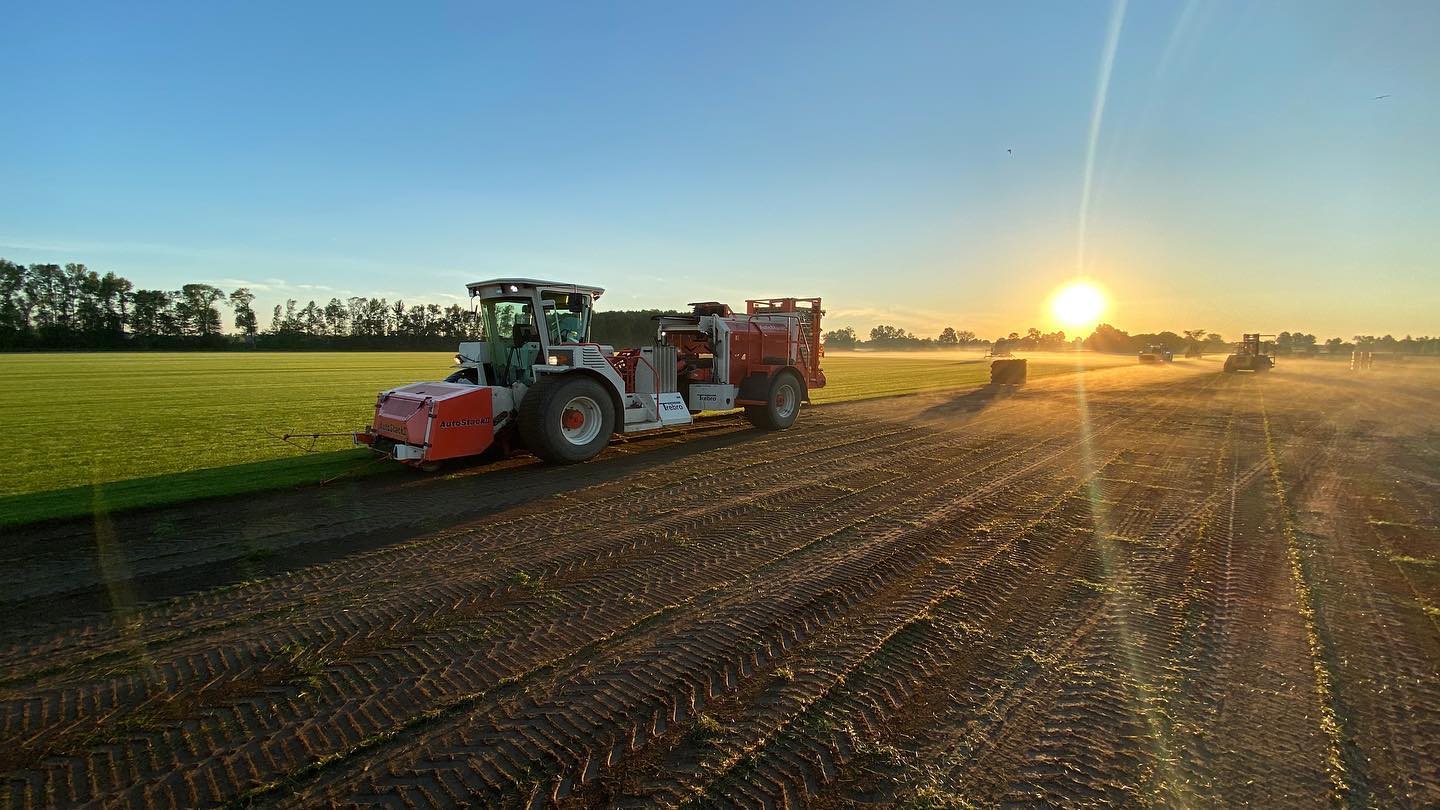 Fairgreen sod fields with equipment working